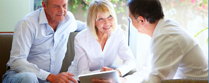 Stock image of Old Couple Discussing with Doctor